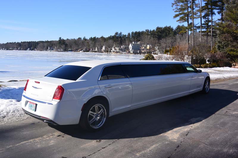 Limo in front of lake